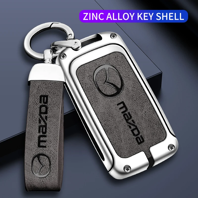 

Car Key Case Shell Car Emblem Keychain Ring For Mazda 6 3CX5 5 2 323 CX7 CX9 CX3 MS Demio Atenza Axela MX30 CX30 MX5 RX8 RX7