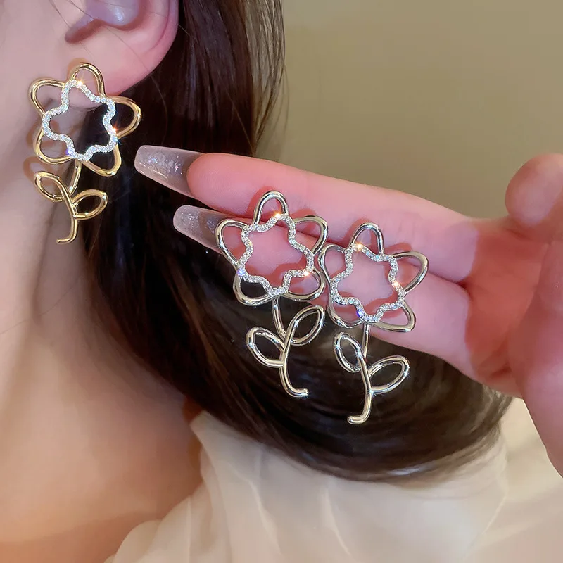 

Minar Cute Lovely Bling CZ Cubic Zirconia Hollow Flower Dangle Earrings for Women Mujer Silver Color Copper Long Earring Brincos