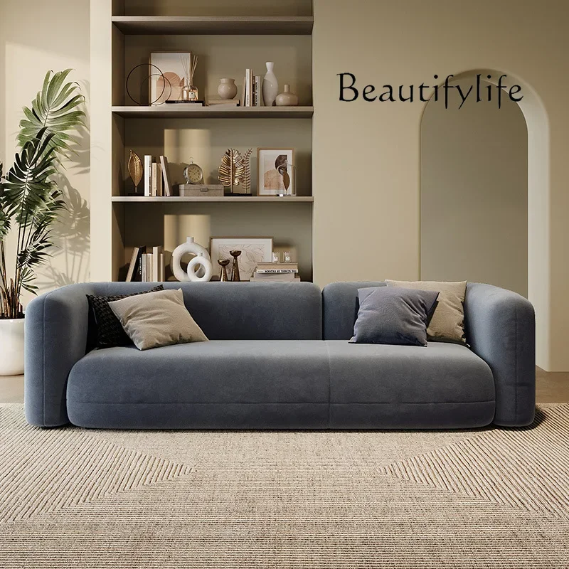 Магазин одежды квартира гостиная темно-зеленый тканевый диван современный