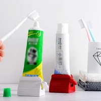 bathroom accessories set rolling toothpaste squeezer tube toothpaste tooth paste squeezer dispenser creative toothpaste holder
