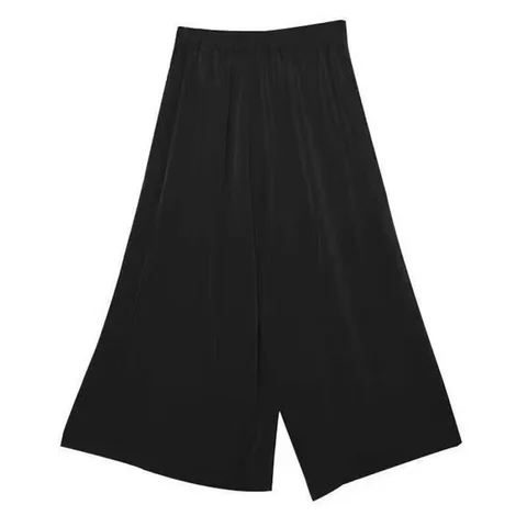 Весенне-осенние новые брюки-юбка из искусственной кожи из двух частей, черные широкие брюки с эластичной резинкой на талии, женские повседневные укороченные брюки нестандартной формы 2023 г.