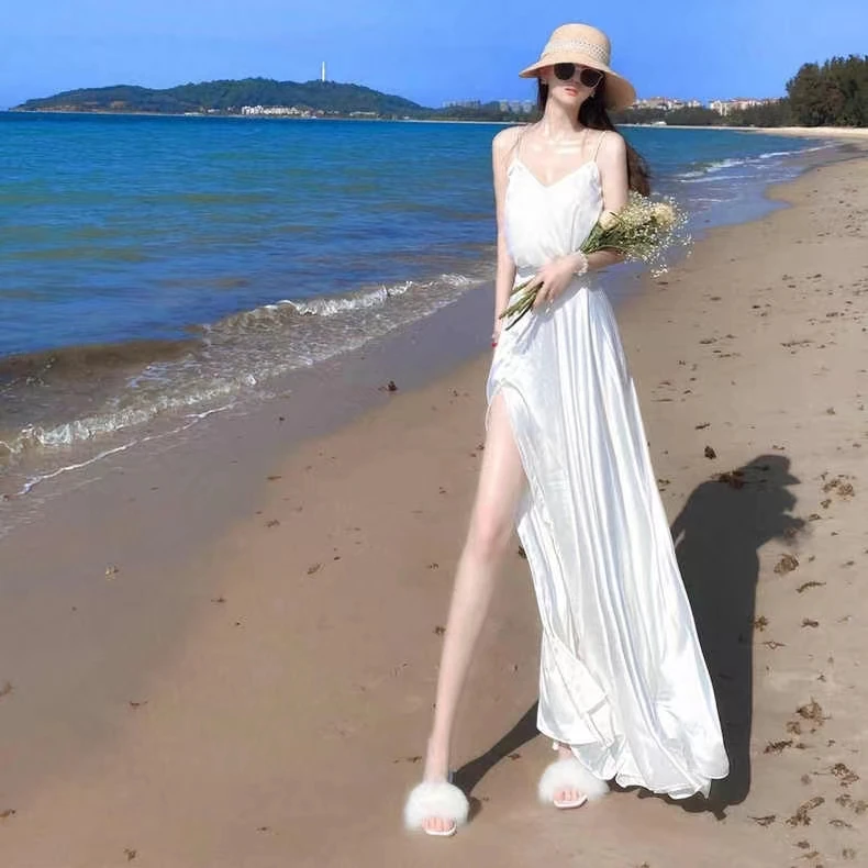

High-end suspenders seaside holiday beach dress female summer British fashion white sexy dress travel wear top star