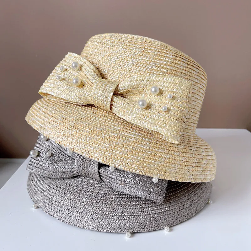 

202303-yl japan dropshipping summer hand fine straw Hepburn pearl bowknot sun protection lady bucket cap women fishermen hat