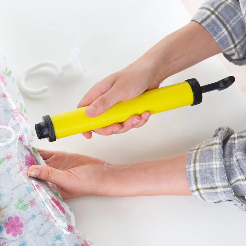 

Compact Size Manual Vacuum Bag Space Saver Saving Seal Compressed Storage Bag Pump Compact Hand Air Vacuum Pump