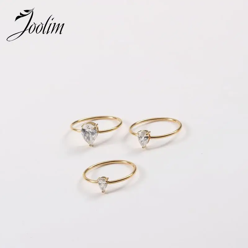 

Joolim Jewelry High End Gold Finish Non Tarnish Classic Trendy Fine Water Drop Zirconia Stainless Steel Finger Rings for Women