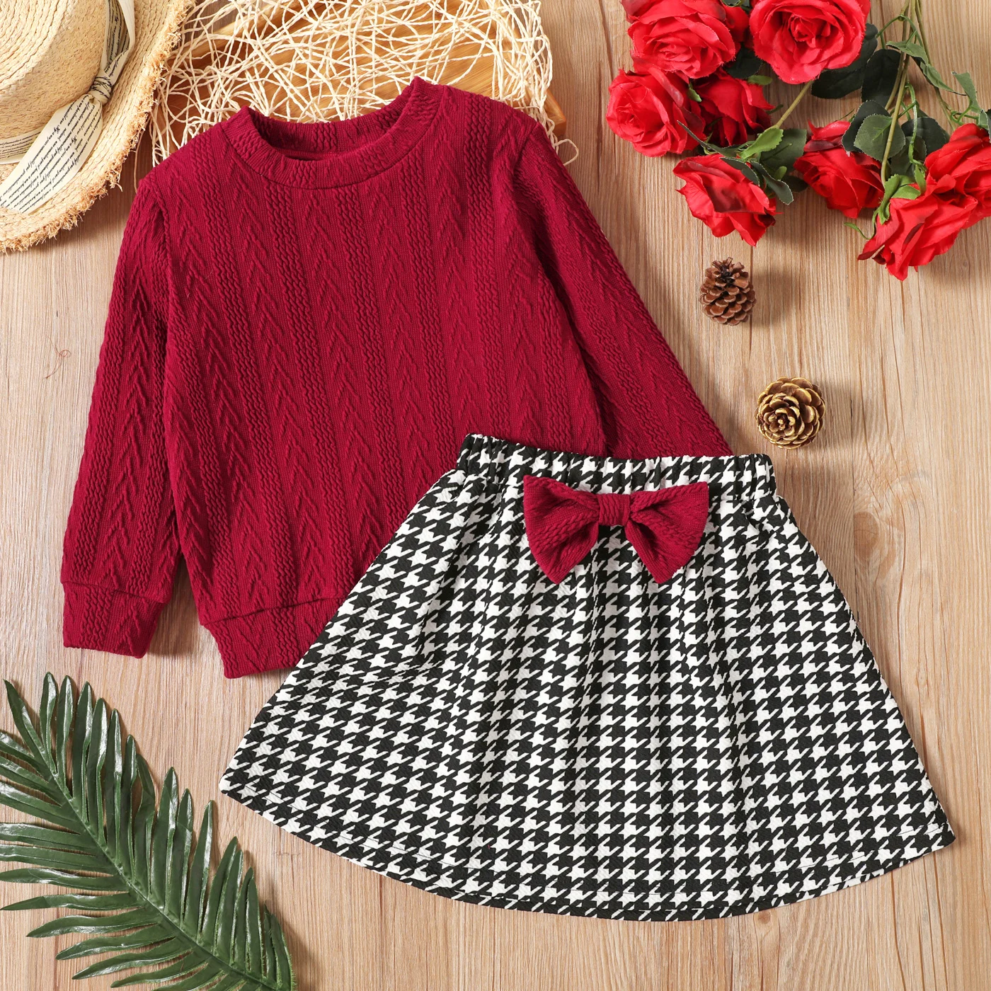 

PatPat 2-piece Toddler Girl Cable Knit Textured Sweater and Bowknot Design Houndstooth Skirt Set