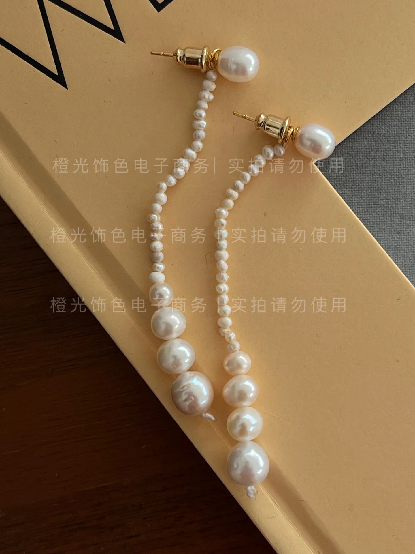 

181 temperament, fashionable, gentle, fresh, elegant, and elegant long grindable pearl earrings, easy to match with 92 pin E11-5