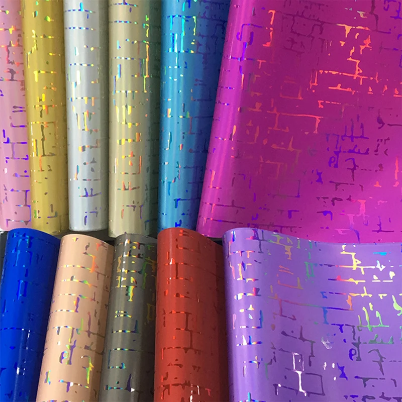 

Holographic Texture Embossed Metallic Laser Mirror Effect PU Faux Leather Fabric for Shoe/Bag/Handbag/Decoration