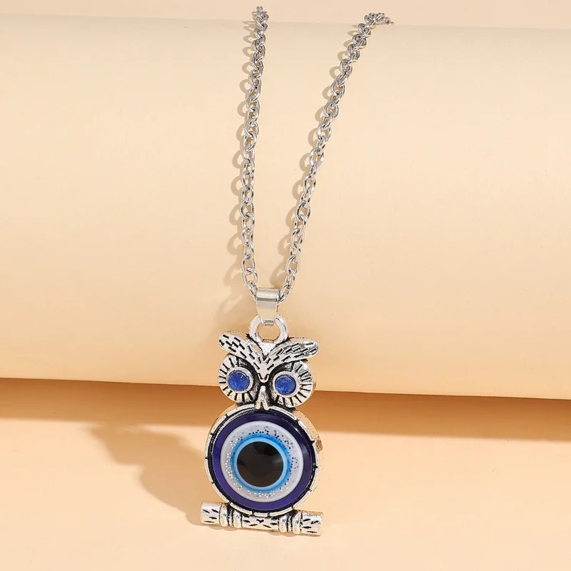 Ins diamond inlaid owl devil's eye personalized pendant creative design fashion accessories