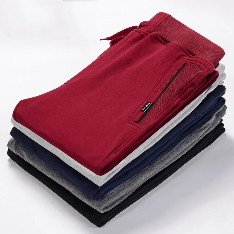 NEW 2022 Spring Summer Men\'s Casual Pants Students City Zipper Pocket Elastic Waist Stretch Men Sweatpants Feet Long Trousers