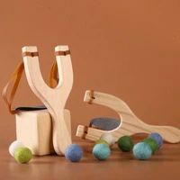 natural wooden slingshot toy with wool ball outerdoor sports creative kids slingshot games catapult hunting toys birthday gifts