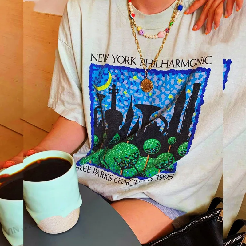

Футболка женская белая с принтом американского ретро-симфонического оркестра Нью-Йорка, модный топ в эстетическом стиле с рисунком масляно...