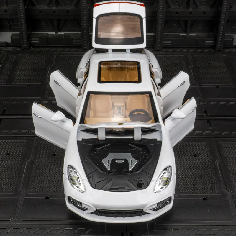 Фото Модель автомобиля Porsche Panamera из сплава металла, масштаб 1:24, коллекционная, с открывающимися дверями, капотом и багажником, со звуковыми и световыми эффектами. №2
