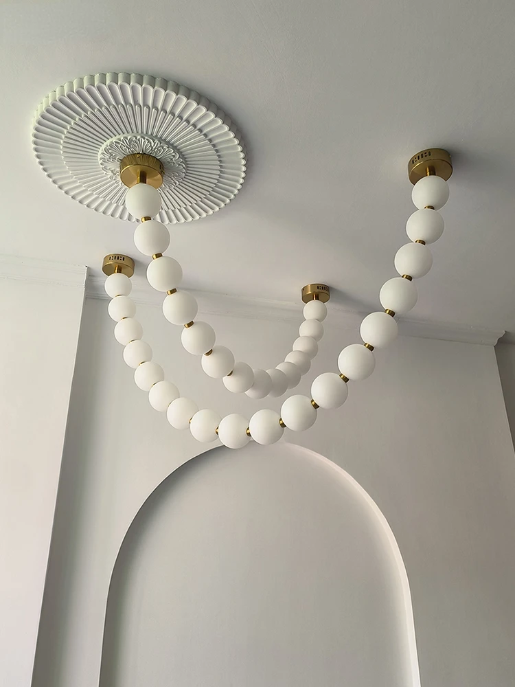 

French style living room lamp, modern and minimalist designer, restaurant bar table lamp, long necklace lamp, Buddha bead