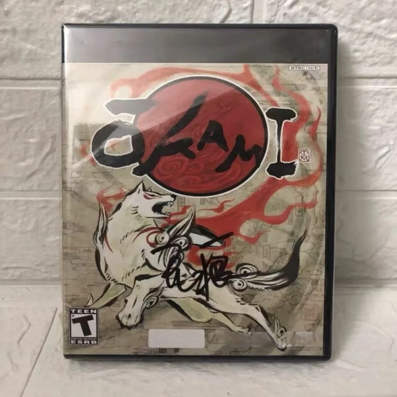 Фото Использованный оригинальный игровой диск для Sony PS2: Okami, американская версия, с инструкцией. №1