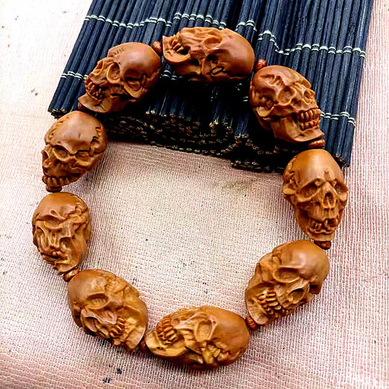 

Olive Stone Skeleton Stone Carving Man Handmade Olive Stone Carving bracelet