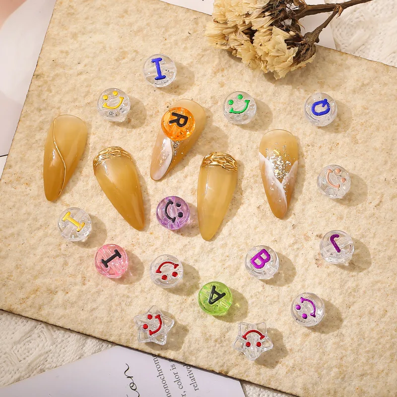 

50pcs Manicure smiling face transparent English letter small middle hole five pointed painting mixed with hollow nail decoration