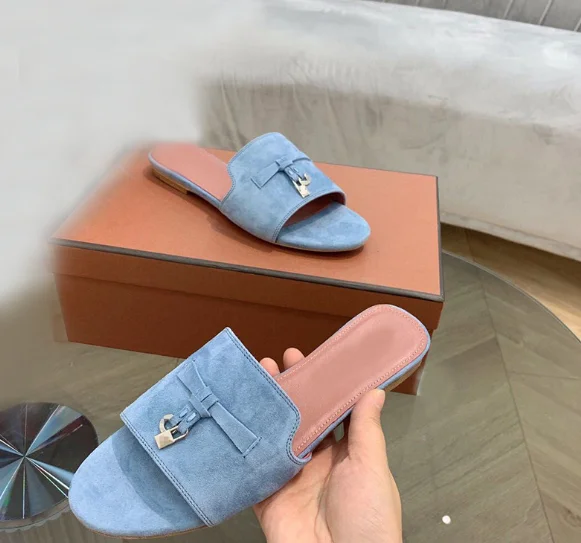 New high quality LP brand women's fashion flat slippers Sheepskin lock fringe casual outdoor slippers summer simple sandals.