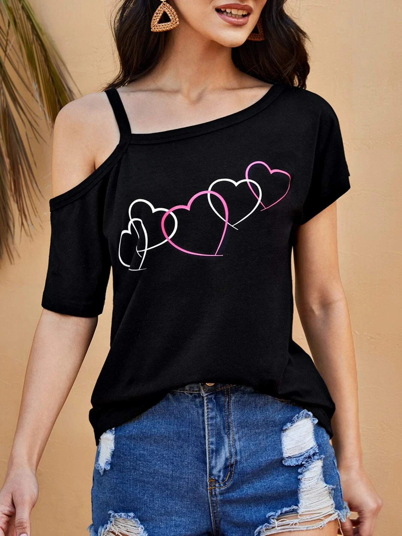 

Asymmetrical Neck Heart Print Top