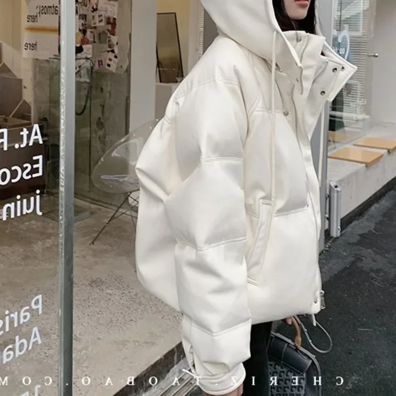 Зимняя женская хлопковая куртка с капюшоном однотонная универсальная в