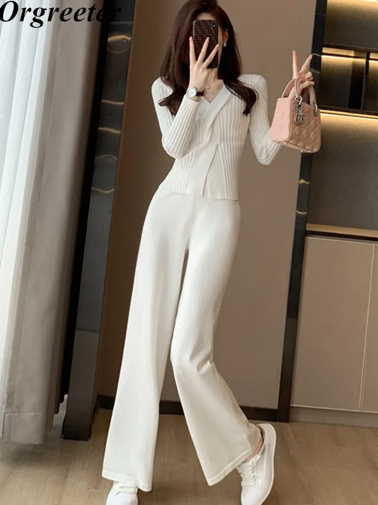 

Однотонный зимний женский свитер и юбка, комплекты из высококачественных трикотажных брюк, вязаный пуловер с перекрещивающимися линиями, топы и широкие брюки, комплект из 2 предметов