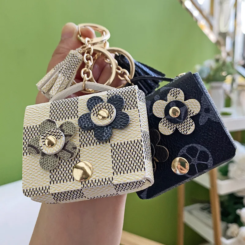 

Элегантная женская сумочка с брелоком, милые цветы, кошелек для монет, кольцо для ключей, Сумка с кисточкой, пряжка из искусственной кожи, по...