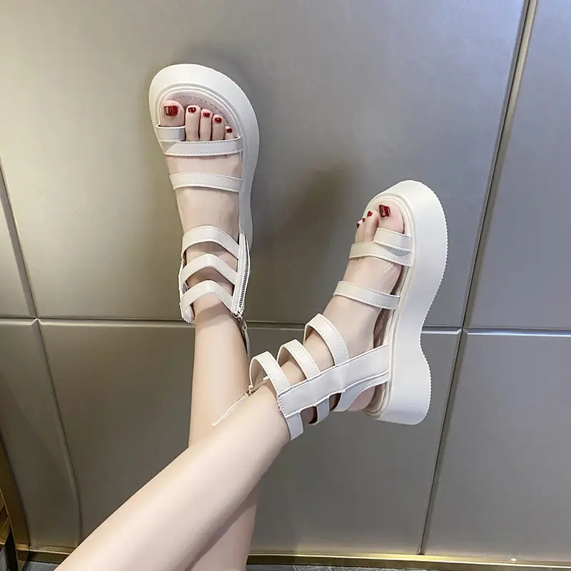 

Cool boots women's new spring and summer 2021 versatile popular anti slip hollow out thick soled Roman shoes wide beach sandals