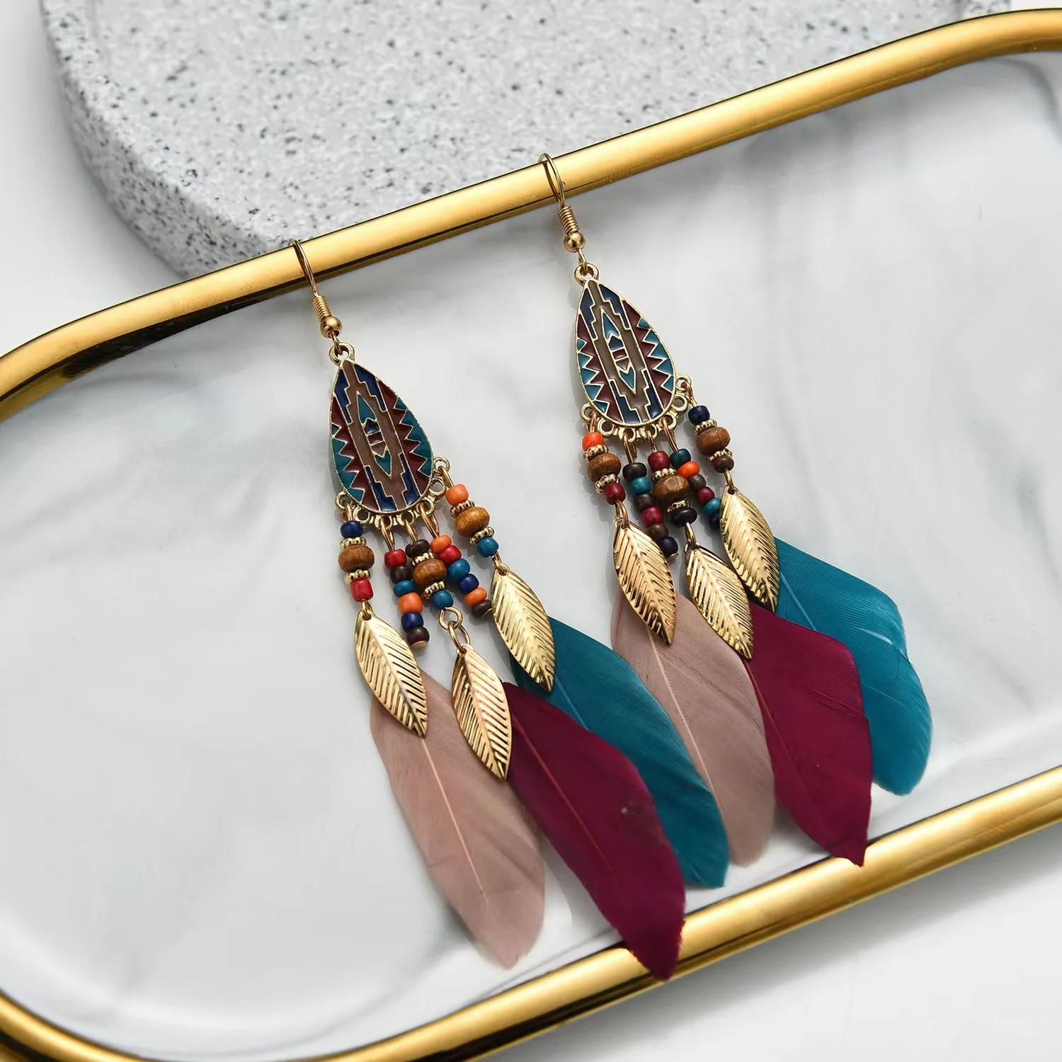 

Summer Fashion Earrings Alloy Leaves Solid Color Feather Pendant Retro Ethnic Style Creative Personality Earrings