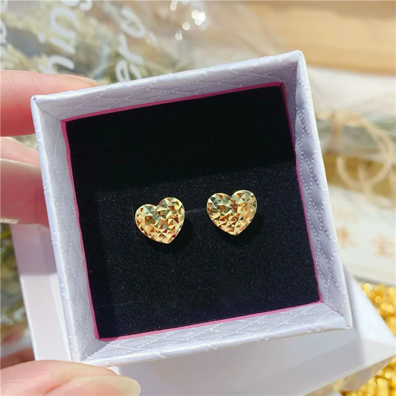 

Женские серьги-гвоздики из 18-каратного желтого золота, 0,56 г