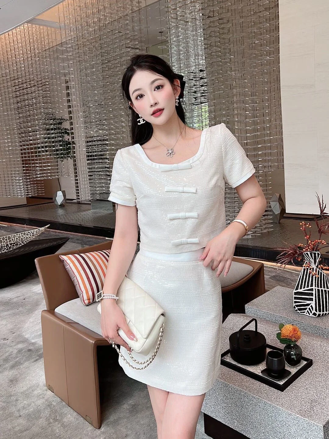 

High end luxury boutique women's clothing 2023 summer new style temperament top short skirt two-piece set 92965