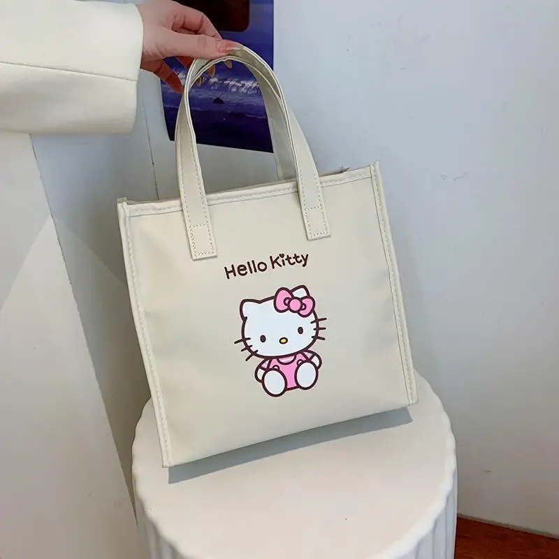 

Sanrio Y2K Kawaii Hellokitty Cinnamoroll Anime Student Handbag Book Stationery Bento Shopping Large Capacity Storage Bag