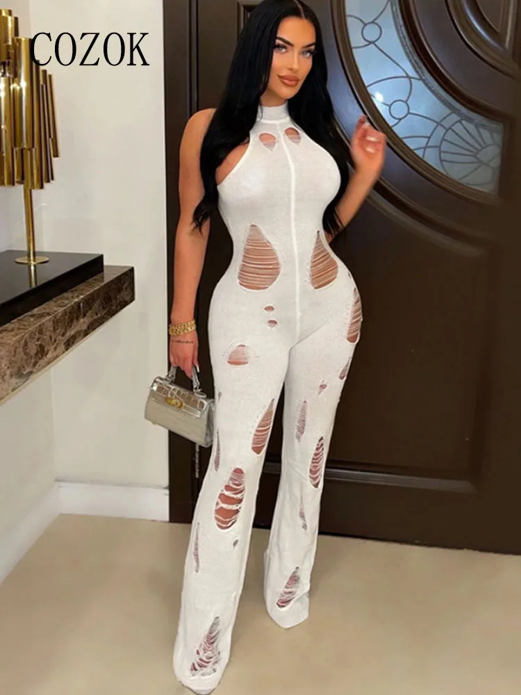 

Cozok Knitted Hollow Out Jumpsuits Women Sexy Sleeveless Backless Slim Hole Romper 2023 Chic Club High Street One Piece Overalls