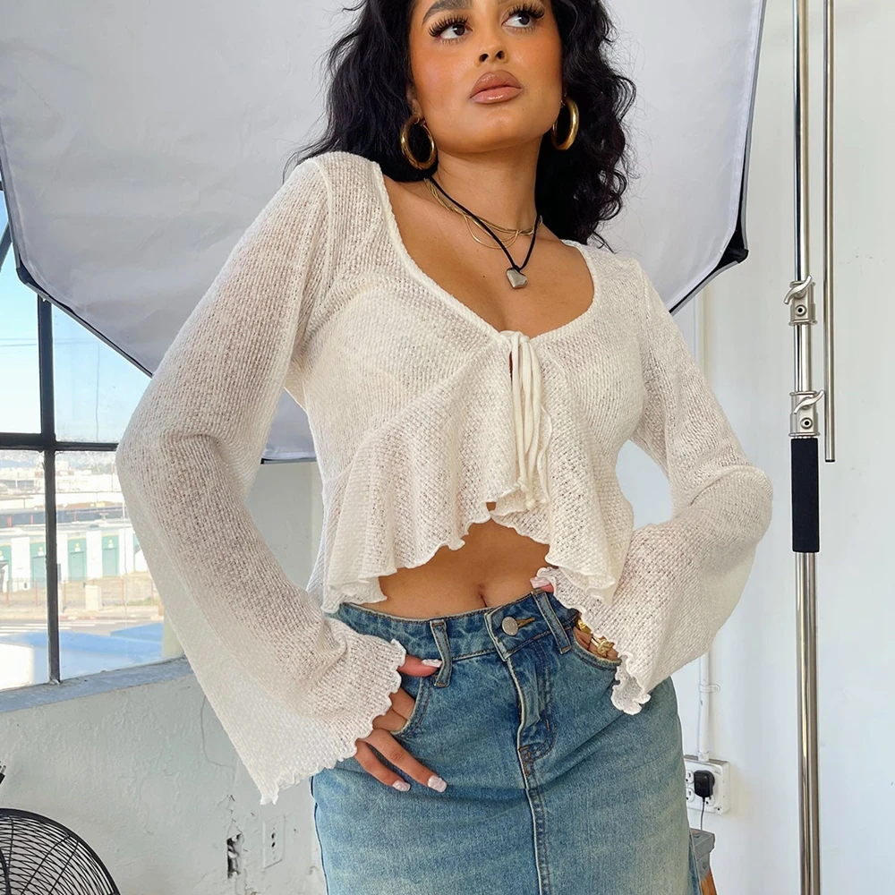 

Женский трикотажный кардиган с глубоким V-образным вырезом и оборками