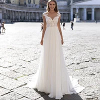 bohemian cap sleeve chiffon wedding dresses lace appliques a line beach bridal gown illusion back floor length vestidos de novia