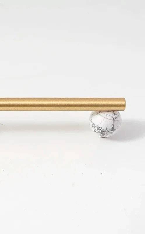 

Ручки Tinyhob для шкафов из натурального мрамора и латуни