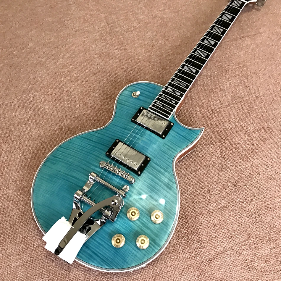 

Custom Electric Guitar, Rosewood Fingerboard, Frets Binding, Tremolo System, Flame Maple Top and Back, Double Convex Surface