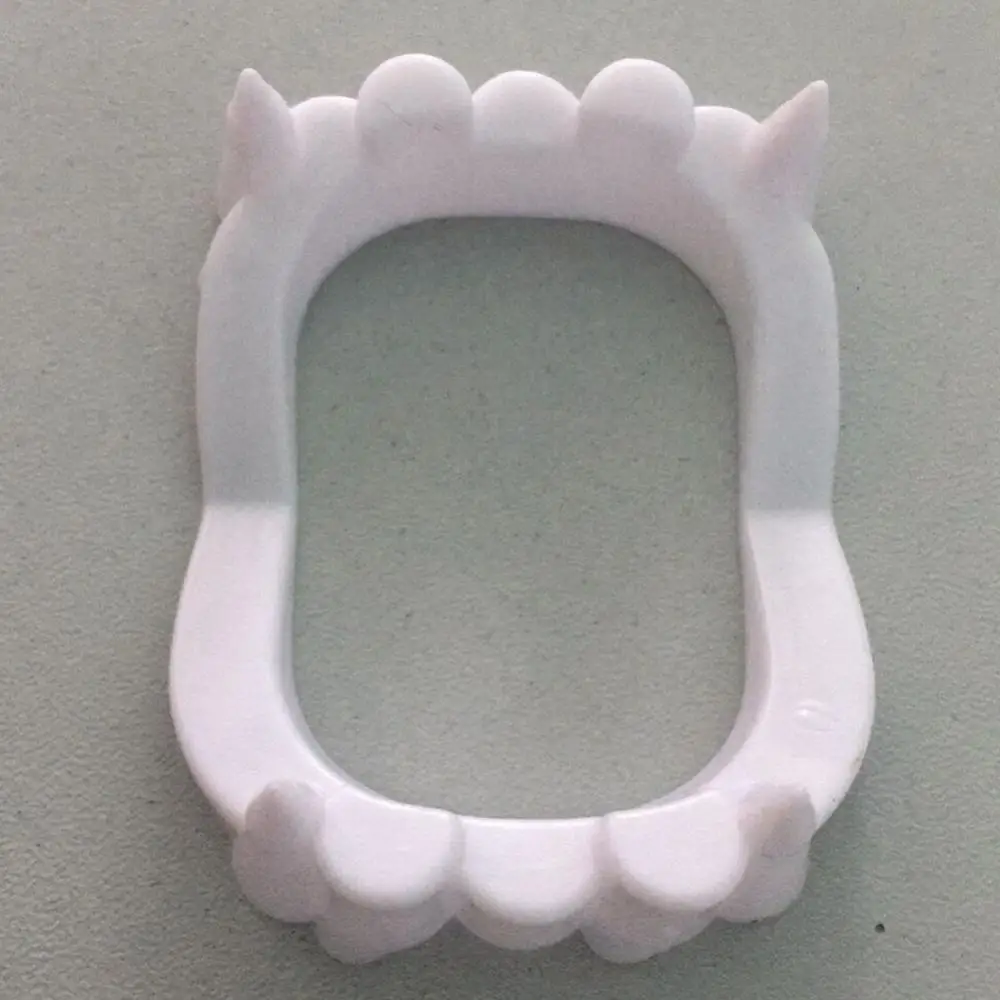 

Пластиковые ложные зубы вампира для Хэллоуина