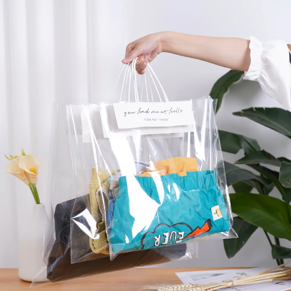 

50Pcs Transparent Plastic OPP Bags with Handle Cellophane Clothing Bags Clear Packing Gift Bag For Wigs Packaging Support Custom