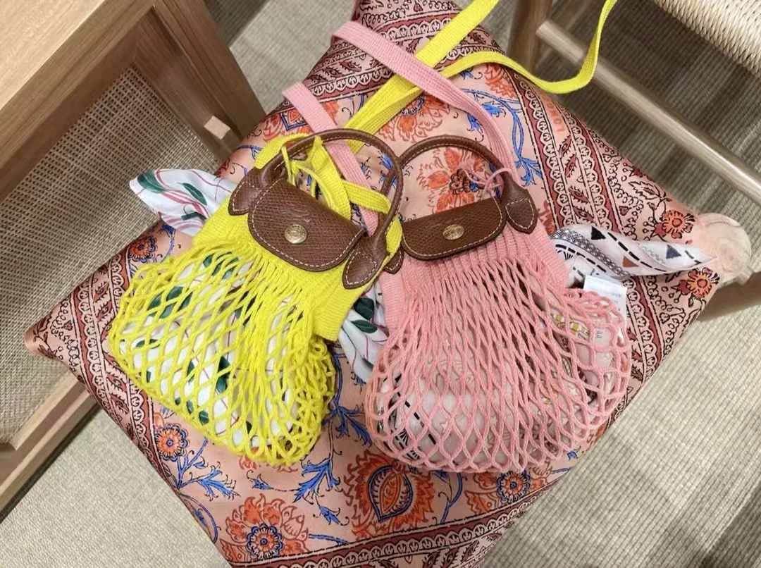 

Longchamp New hollow out woven bag cotton lining straw bag for summer beach female Reticulate handbag netted beach bag