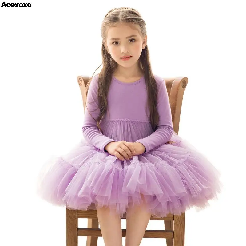 

Baby girl falls along long sleeve cloth tulle skirt