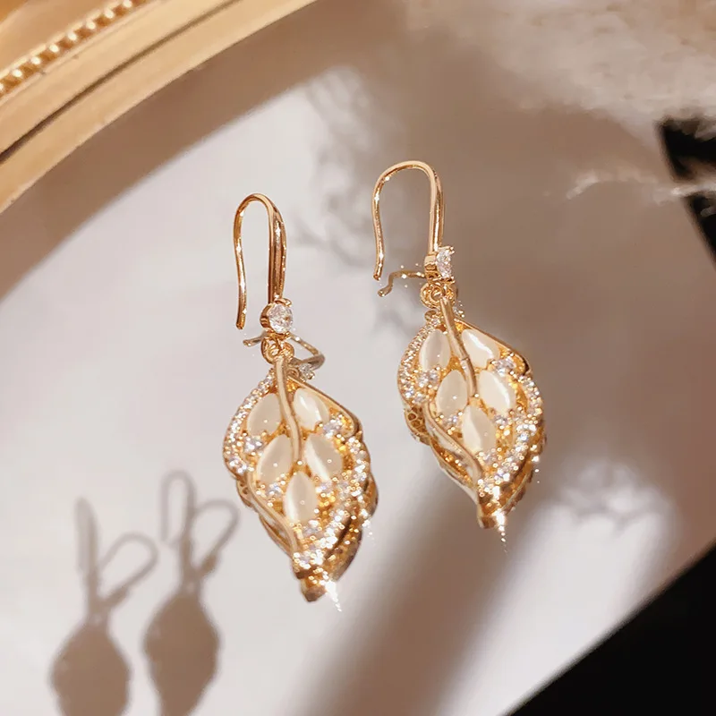 

Cogonia 14K Gold Plated Opal leaves Dangle Earrings For Women Shiny Zircon 925 Silver Needle Designer Drop Earring Jewelry Gift