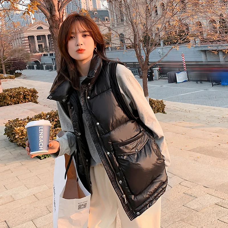 Winter New Ultra Light Loose Vest Jacket Women 90% White Duck Down Stand Collar Coat Hem Retractable Solid Color Vest