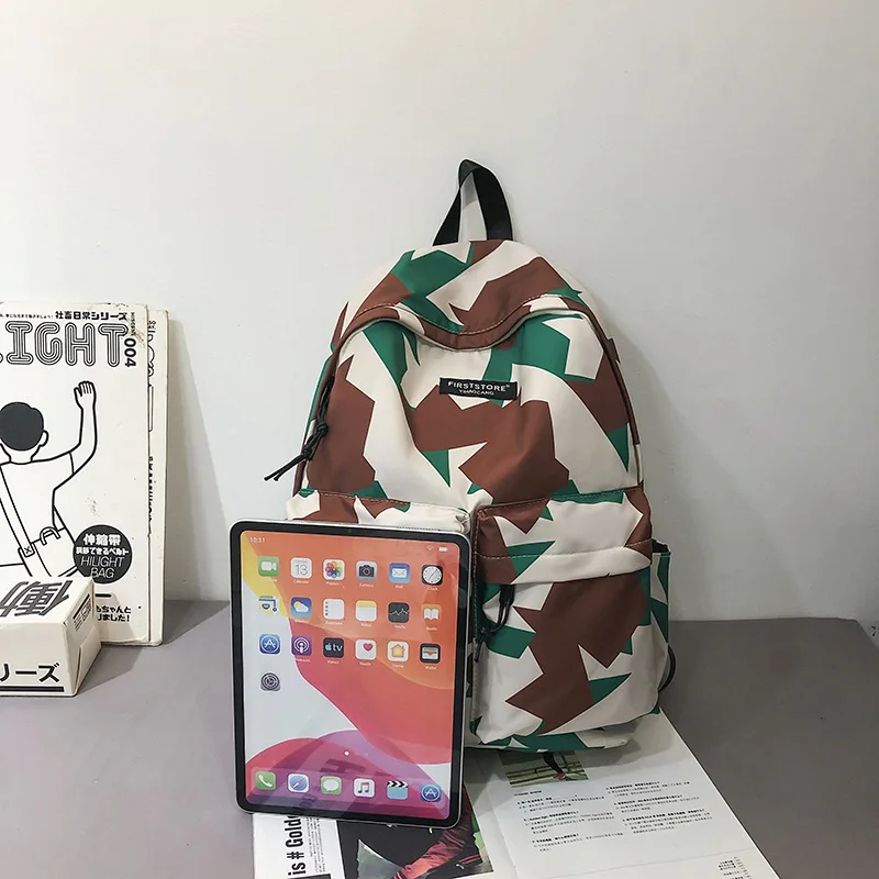 Korean fashion couple large capacity backpack female personalized graffiti double button bag student schoolbag male Backpack