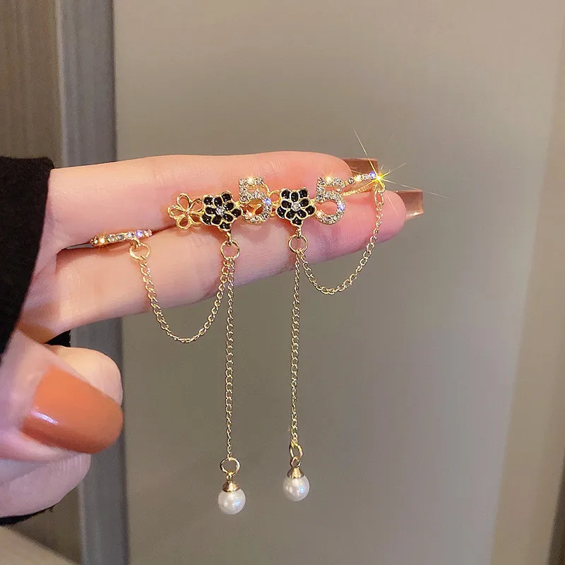 

Женские блестящие серьги-каффы с жемчугом и бантом