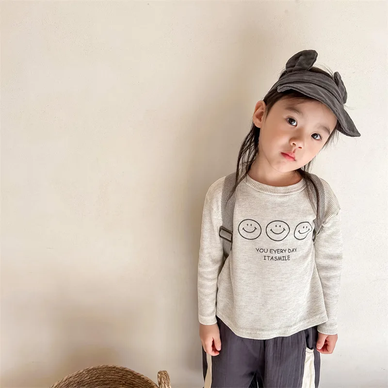 

Kids cotton cartoon Waffle Tees boys and girls loose long sleeve Tops