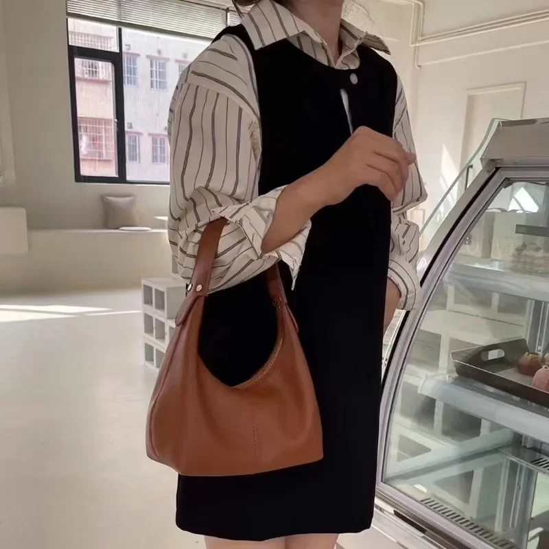 

Small Bag Women's Handbags Purse 2024 New Hand Bill Of Lading Shoulder Bag Bump Color Simple Pu Soft Skin Dumpling Underarm Bag