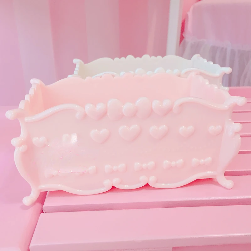 

Розовая трехслойная пластиковая коробка для хранения украшений