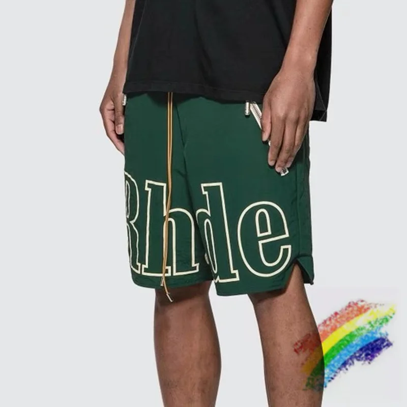 

Rhude Shorts Men Women Big Letter Logo Rhude Shorts Oversize Breechcloth Yellow Drawstring Pill Zipper Head