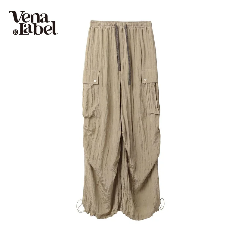 Женские брюки на шнуровке с высокой талией и карманами