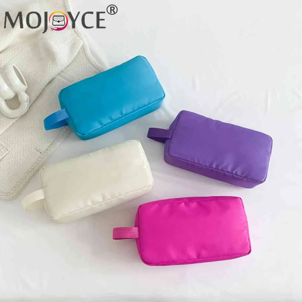 

Женская сумка для макияжа нейлоновая сумка для косметики, портативная, повседневная, многофункциональная, однотонная, вместительная, прост...